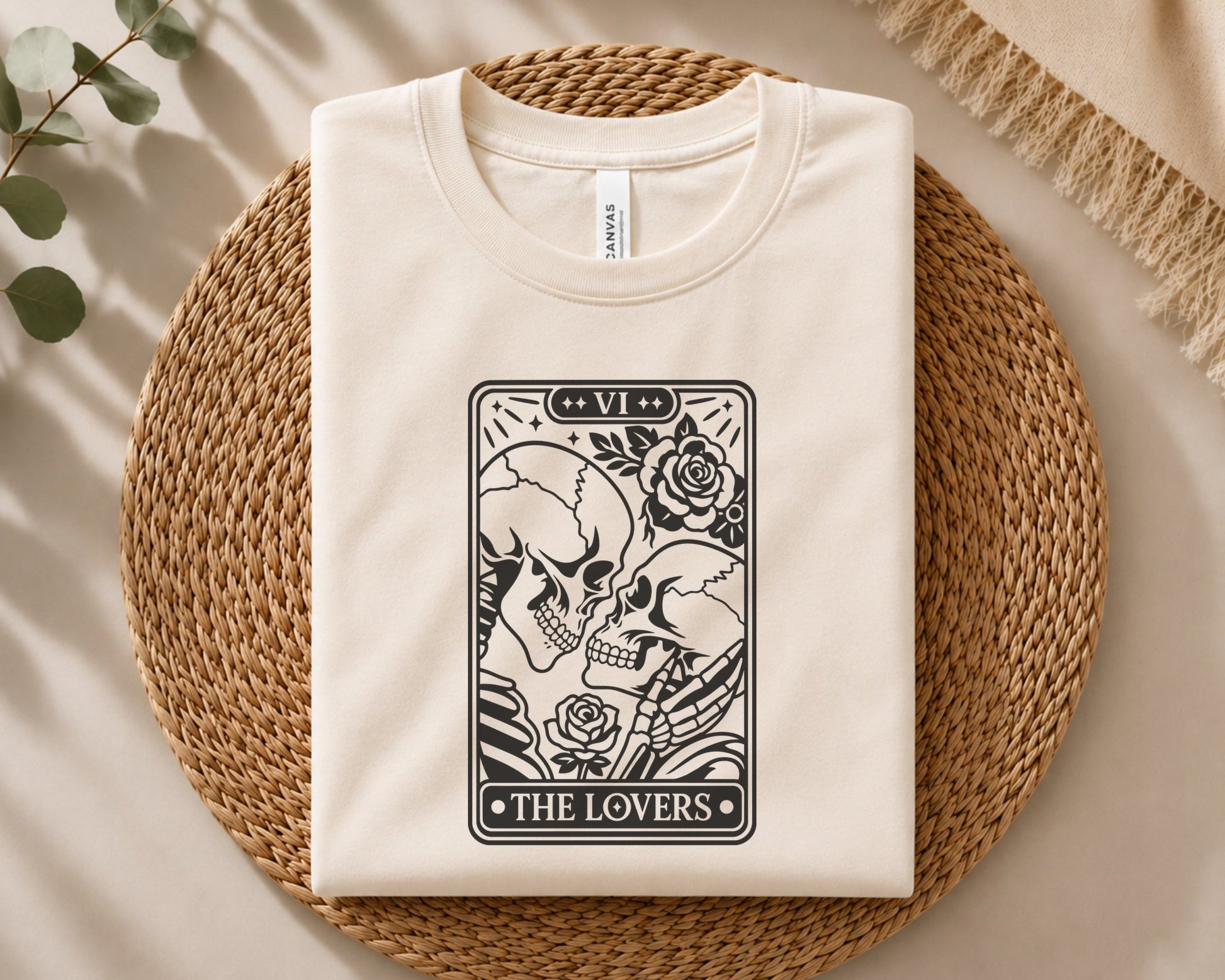 Gothic Lovers tarot artwork featuring a romantic skull couple, floral roses, Roman numeral VI and detailed black line art inside a card frame.