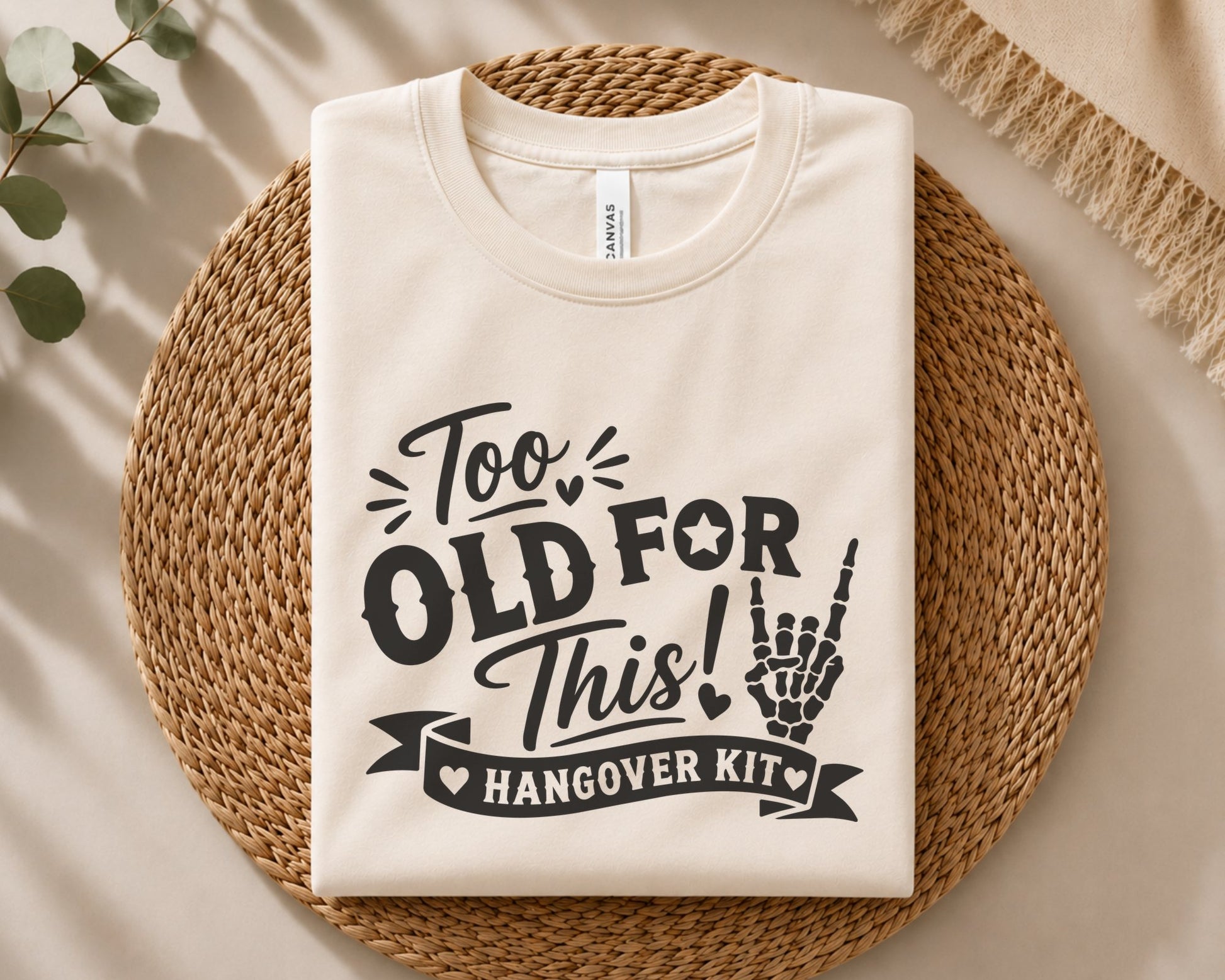 Playful quote artwork with bold lettering, script typography, skeleton hand illustration and decorative banner in a clean black design.